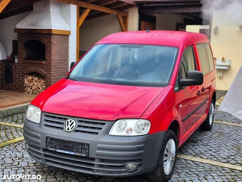 Second-hand VW Caddy Family 105 CP (77 kW) 2007 Culoarerosu Monovolum