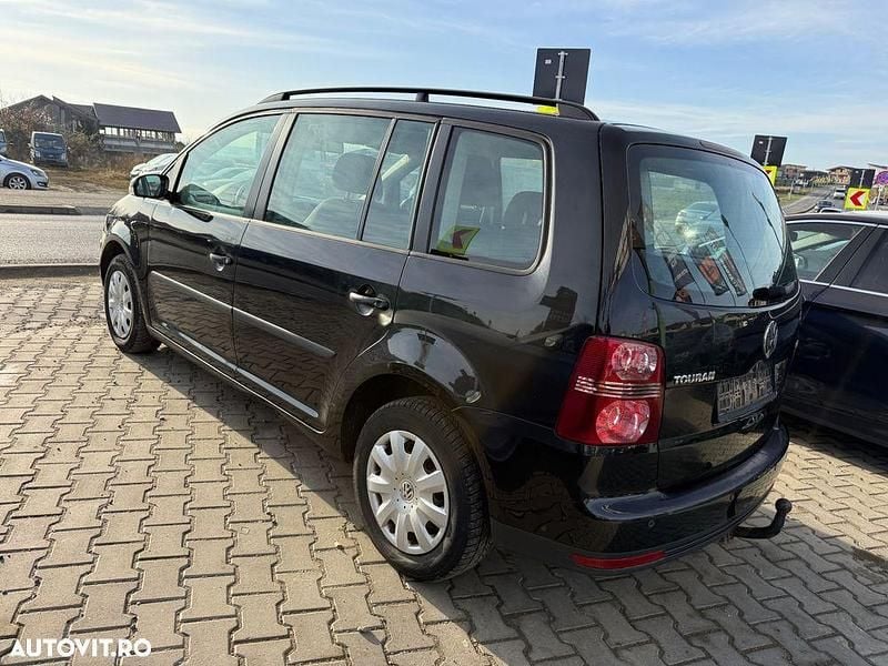 Second-hand VW Touran Comfortline 140 CP (102 kW) 2009 Culoarenegru Monovolum
