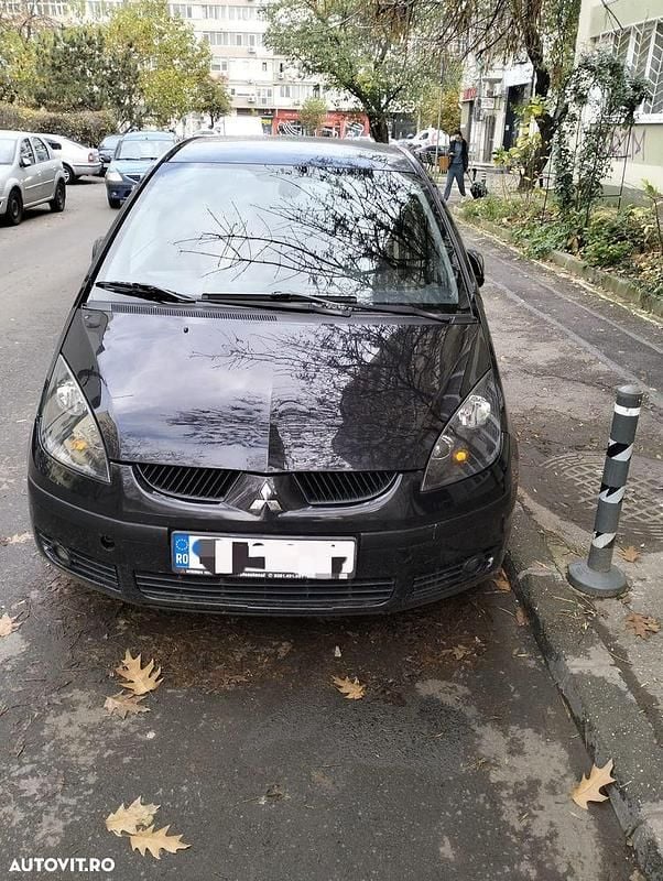 Culoarenegru Utilizat 2007 Mitsubishi Colt | 2.699 EUR - Imagine 1/4