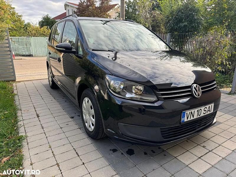 Culoarenegru Utilizat 2014 VW Touran Highline Monovolum | 5.350 EUR - Imagine 1/4