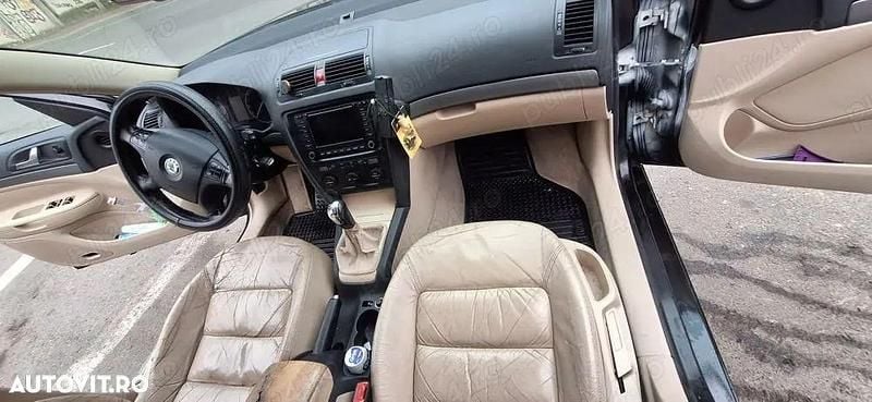 Culoarenegru Utilizat 2006 Skoda Octavia Elegance Break | 2.999 EUR (Preț OK) - Imagine 1/4
