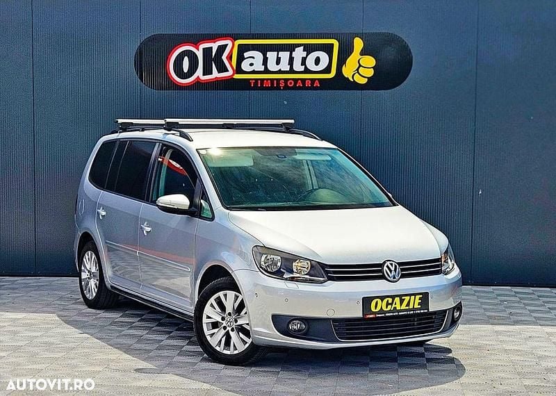 Second-hand VW Touran 105 CP (77 kW) 2013 Culoareargint Monovolum