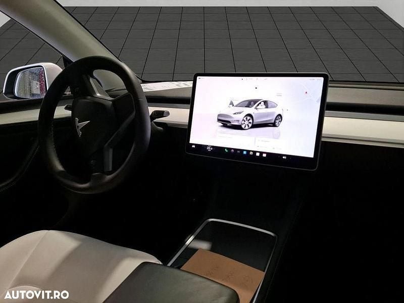 Second-hand Tesla Model Y 378 kW (514 CP) 2023 Culoarealb SUV