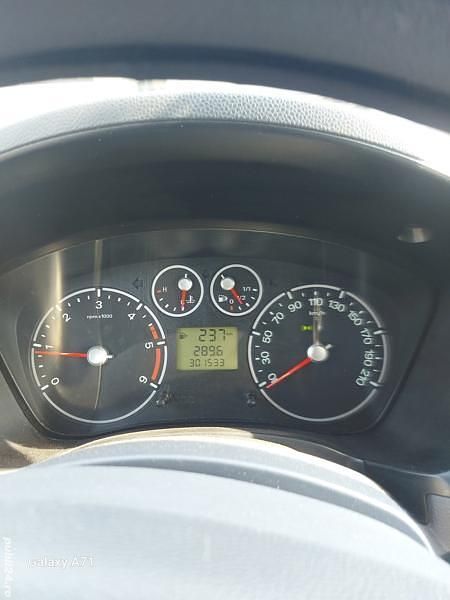 Second-hand Ford Tourneo Connect 66 CP (48 kW) 2012 Gri Monovolum