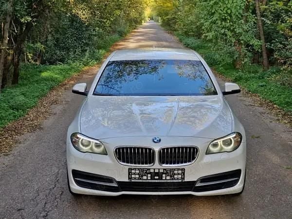 Second-hand BMW 520 184 CP (135 kW) 2014 Berlinǎ