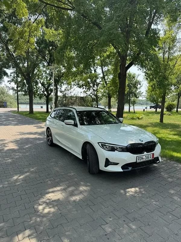Alb Utilizat 2021 BMW 318 Berlinǎ | 18.300 EUR (Preț bun) - Imagine 1/4