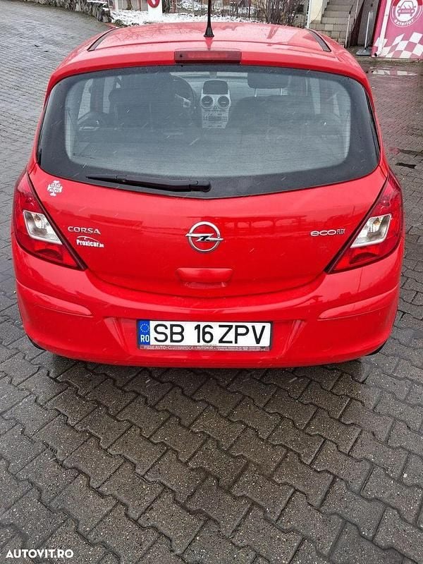 Second-hand Opel Corsa Cosmo 95 CP (69 kW) 2012 Culoarerosu Hatchback