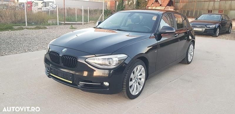 Culoarenegru Utilizat 2011 BMW 118 Sport Line Hatchback | 5.800 EUR (Preț OK) - Imagine 1/4