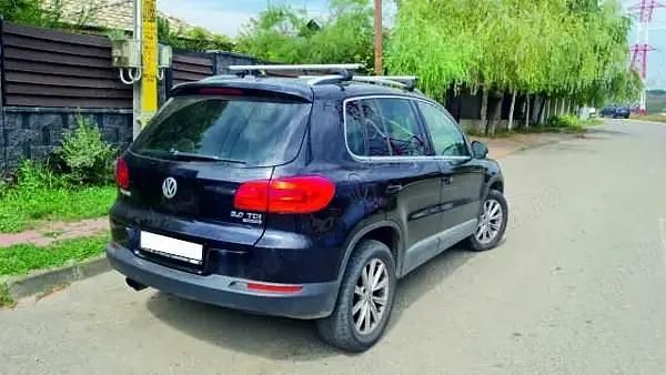 Negru Utilizat 2014 VW Tiguan SUV | 9.500 EUR (Preț OK) - Imagine 1/4