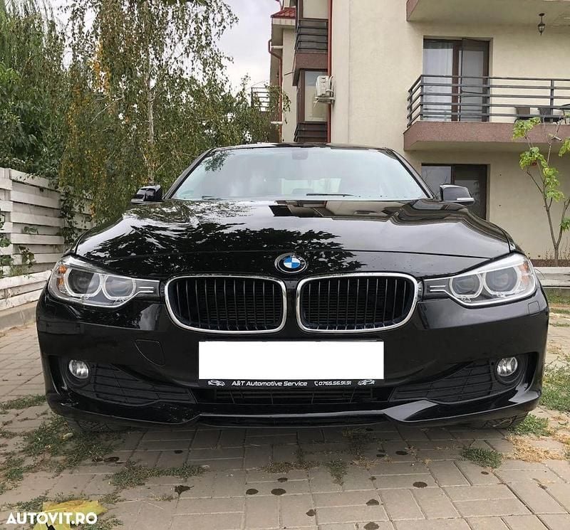 Culoarenegru Utilizat 2014 BMW 318 Berlinǎ | 11.950 EUR (Preț OK) - Imagine 1/4
