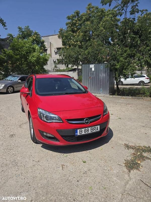 Rosu Utilizat 2014 Opel Astra Sport Break | 5.000 EUR (Preț OK) - Imagine 1/4