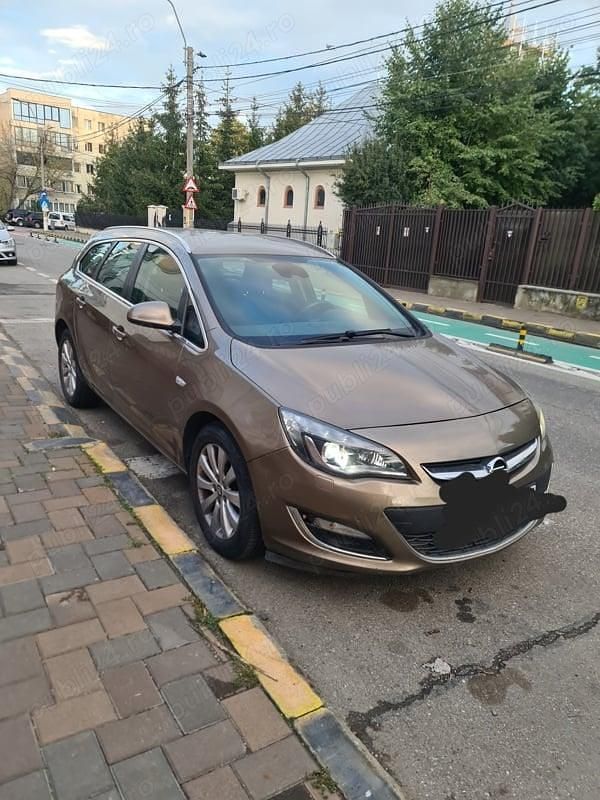 Bej Utilizat 2013 Opel Astra Exklusiv Break | 5.500 EUR (Preț OK) - Imagine 1/4