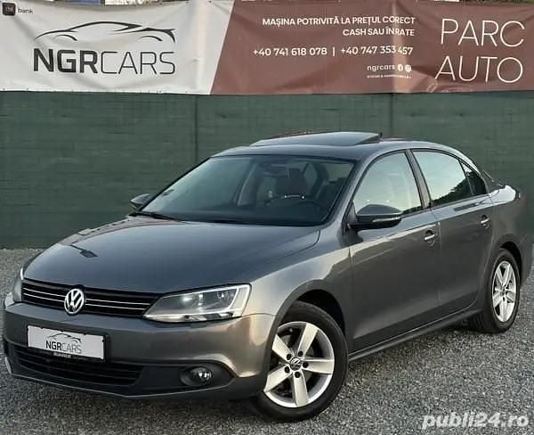 Gri Utilizat 2013 VW Jetta Berlinǎ | 6.750 EUR (Preț OK) - Imagine 1/4