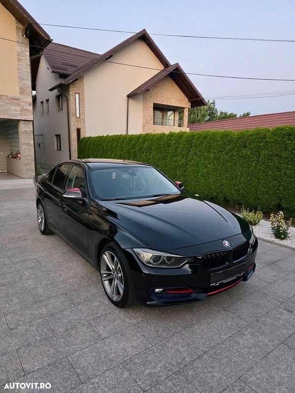 Culoarenegru Utilizat 2014 BMW 320 Sport Line Berlinǎ | 11.200 EUR (Preț bun) - Imagine 1/4