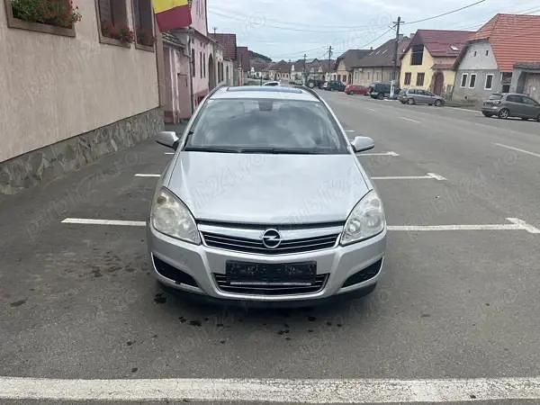 Argintiu Utilizat 2008 Opel Astra Break | 1.990 EUR (Preț OK) - Imagine 1/4
