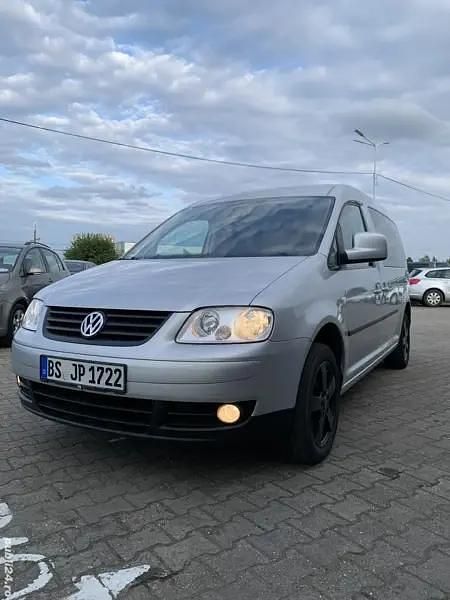 Second-hand VW Caddy Maxi Life 105 CP (77 kW) 2010 Argintiu Monovolum