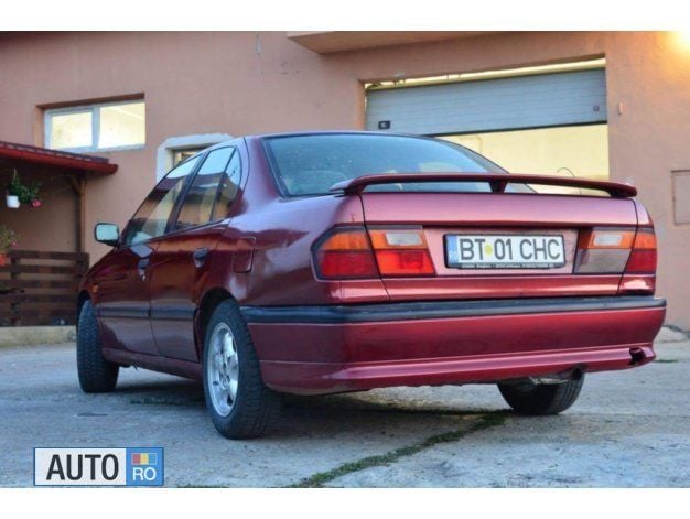 Second-hand Nissan Primera 90 CP (66 kW) 1994 Rosu Berlinǎ