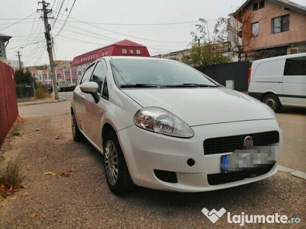 Second-hand Fiat Grande Punto 75 CP (55 kW) 2011 Alb Hatchback