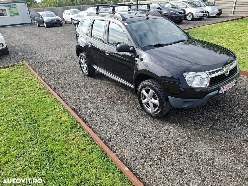Culoarenegru Utilizat 2011 Dacia Duster Ambiance SUV | 4.600 EUR (Preț bun) - Imagine 1/4