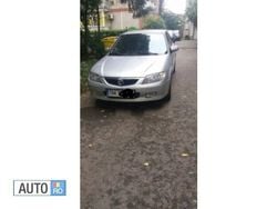 Gri Utilizat 2002 Mazda 323 Hatchback | 1.200 EUR