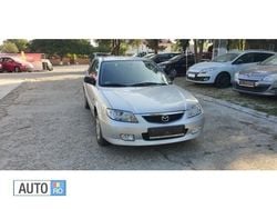 Gri Utilizat 2001 Mazda 323 Break | 1.499 EUR