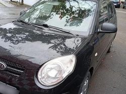 Culoarenegru Utilizat 2010 Kia Picanto Hatchback | 2.222 EUR