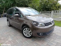 Culoaremaro Utilizat 2014 VW Touran Highline Monovolum | 6.700 EUR (Preț bun)
