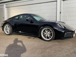 Culoarenegru Utilizat 2024 Porsche 911 Carrera Coupe | 90.900 EUR