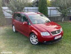 Culoarerosu Utilizat 2006 VW Touran Cross Monovolum | 3.250 EUR