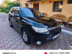 Culoarenegru Utilizat 2013 Mitsubishi Outlander SUV | 8.200 EUR (Preț OK)