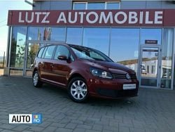 Visiniu metalizat Utilizat 2014 VW Touran Trendline Monovolum | 9.990 EUR (Scump)