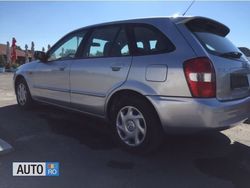Argintiu Utilizat 2002 Mazda 323 Hatchback | 1.650 EUR