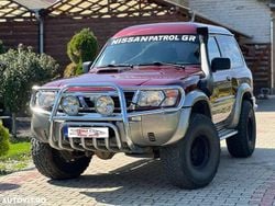 Culoarerosu Utilizat 2002 Nissan Patrol SUV | 9.999 EUR