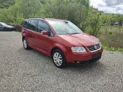 Roşu Utilizat 2007 VW Touran Monovolum | 2.300 EUR