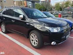 Negru Utilizat 2014 Mitsubishi Outlander P-HEV Top SUV | 10.500 EUR