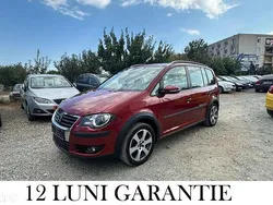 Culoarerosu Utilizat 2009 VW Touran Monovolum | 5.250 EUR
