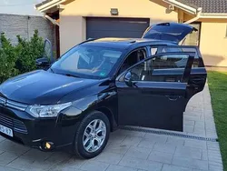Culoarenegru Utilizat 2014 Mitsubishi Outlander P-HEV Break | 8.999 EUR