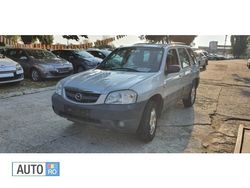 Argintiu Utilizat 2003 Mazda Tribute SUV | 2.499 EUR