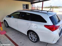 Culoarealb Utilizat 2015 Toyota Auris Hybrid Comfort Hatchback | 9.499 EUR (Super Preț)