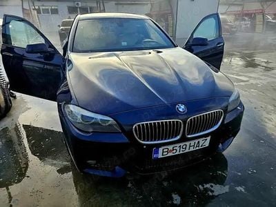 Second-hand BMW 520 180 CP (132 kW) 2014 Albastru Berlinǎ