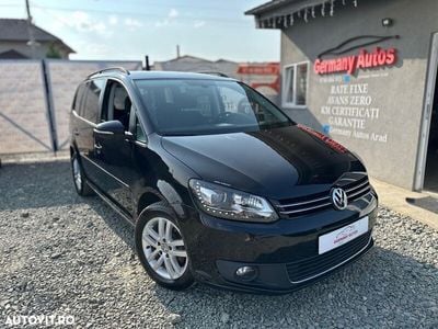 Second-hand VW Touran 115 CP (84 kW) 2014 Negru Monovolum