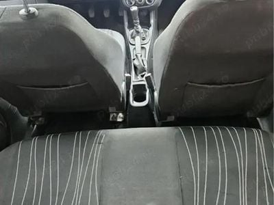 Second-hand Opel Corsa 95 CP (69 kW) 2010 Rosu Hatchback