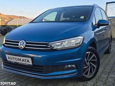 Second-hand VW Touran 115 CP (84 kW) 2019 Culoarealbastru Monovolum