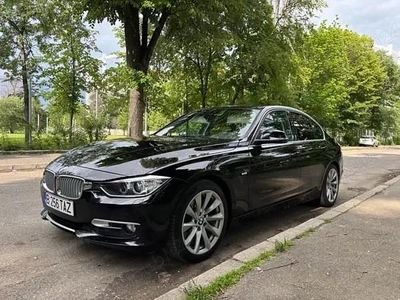 Second-hand BMW 320 184 CP (135 kW) 2014 Negru Berlinǎ