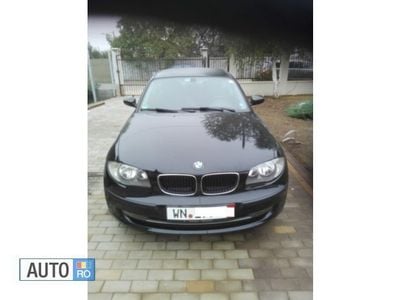 Second-hand BMW 116 122 CP (89 kW) 2008 Negru Hatchback