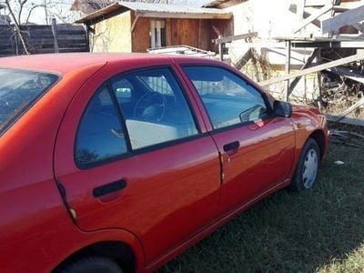 Second-hand Nissan Almera 73 CP (53 kW) 1999 Roşu Hatchback