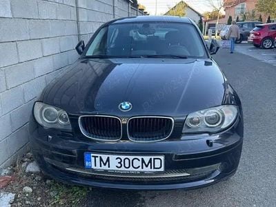 Second-hand BMW 116 122 CP (89 kW) 2010 Negru Hatchback