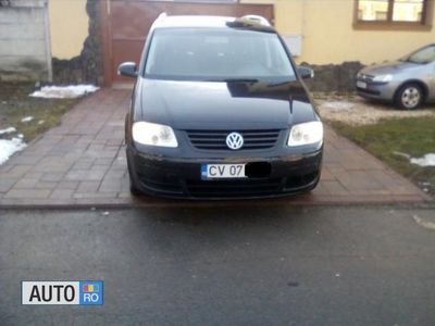 Second-hand VW Touran 101 CP (74 kW) 2004 Negru Monovolum