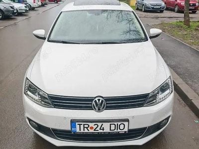 Second-hand VW Jetta Highline 122 CP (89 kW) 2012 Alb Berlinǎ