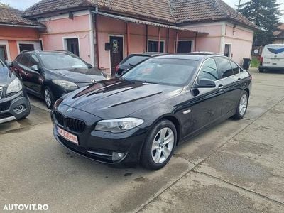 Second-hand BMW 520 Luxury Line 184 CP (135 kW) 2011 Negru Berlinǎ